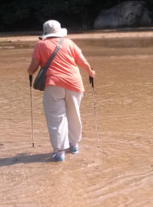 wading the stream in Quimixto